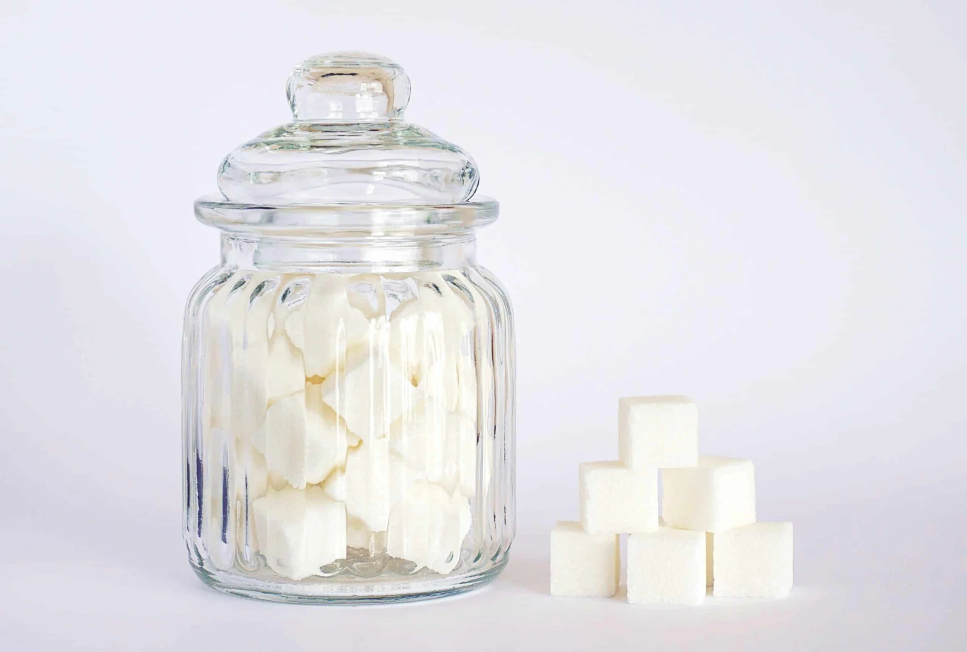 Sugar cubes in a glass jar.